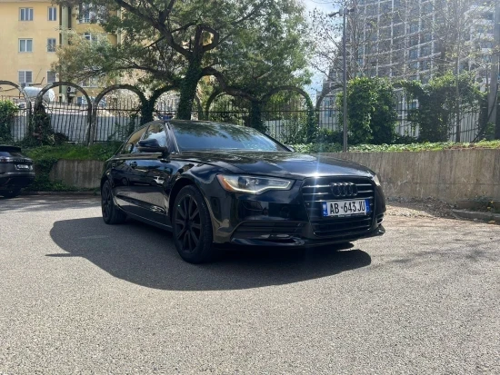 Noleggia una Audi A6 dell'anno 2013 a Tirana